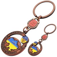 Брелок металевий – Карта України на глобусі (крутяшка, бронза)